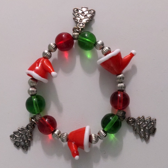 Whimsical Fun Slip-On Christmas Bracelet with Santa Hats and Xmas Trees - Picture 2 of 8